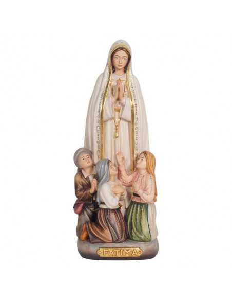 Painted wooden statue of Our Lady of Fatima with shepherds
