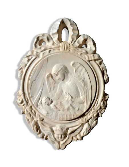 Joli médaillon ou bas-relief en plâtre de l'ange à l'étoile.