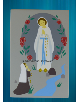 Tableau de Notre-Dame de Lourdes en bois peint réalisé par des artisans d'un atelier solidaire.
