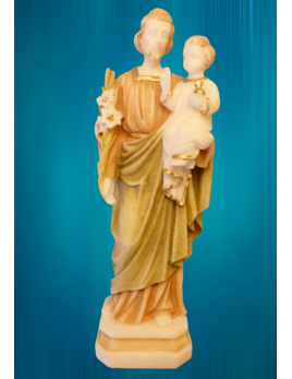 Statue en albâtre colorée de saint Joseph portant l'Enfant Jésus.