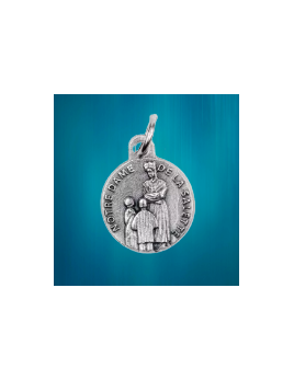 Médaille de Notre-Dame de la Salette en métal de couleur argentée.