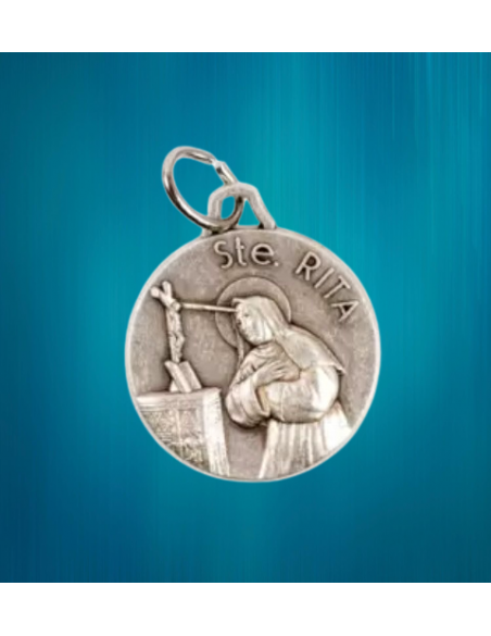 Médaille de sainte Rita en métal argenté.