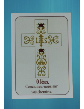 Une image de la croix avec l'inscription "IHS" au centre