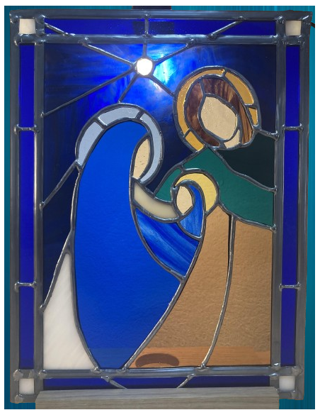Vitrail de la Sainte Famille réalisé par l'Atelier des Séraphins Vitrail, réalisé en verre soufflé à la bouche.